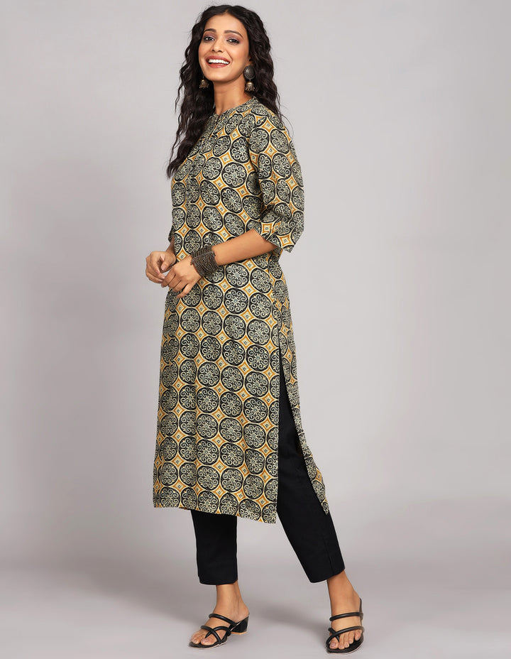 Close-up view of Rust Yellow Kurti with hand block Print, focusing on the fabric texture, neckline, Buttons and stitching details.