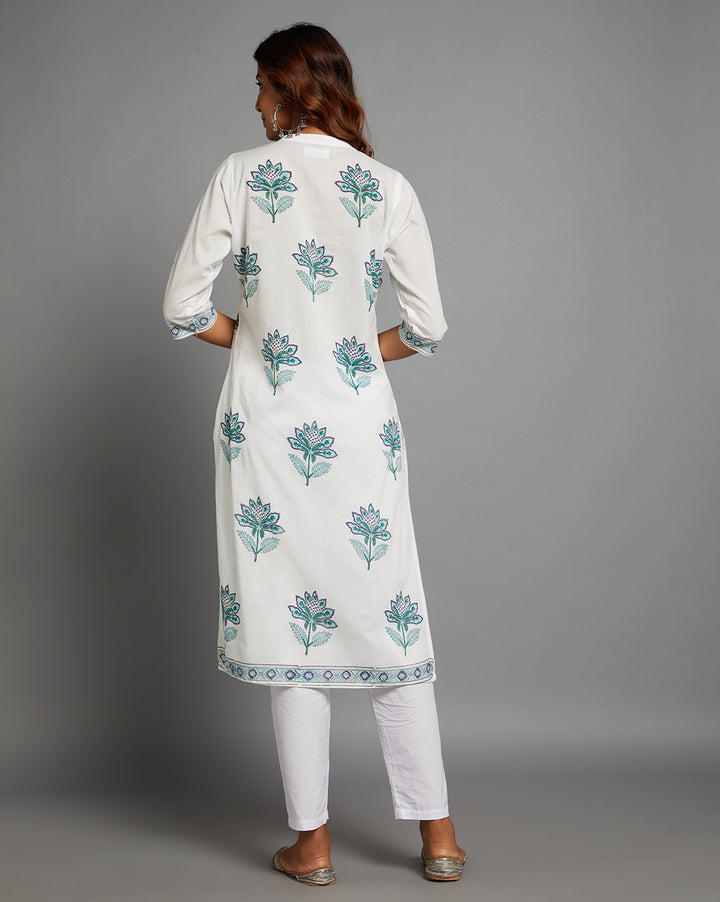 Woman showing the back view of White Cotton Straight Kurta with Chinese Collar and V-Neck with three-quarter sleeve paired with white pant and jutti, highlighting the relaxed fit and simple design from behind.
