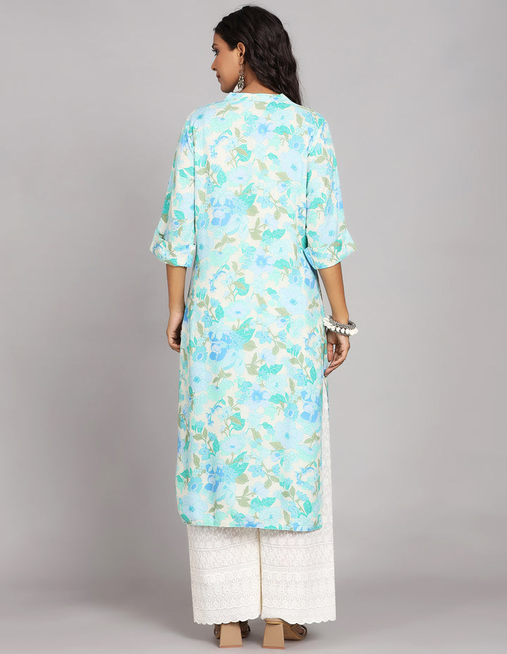 Woman showing the back view of a  Blue color Long Kurti with collar Neck design and three-quarter sleeve, paired with white palazzo and brown heels, highlighting the relaxed fit and simple design from behind.