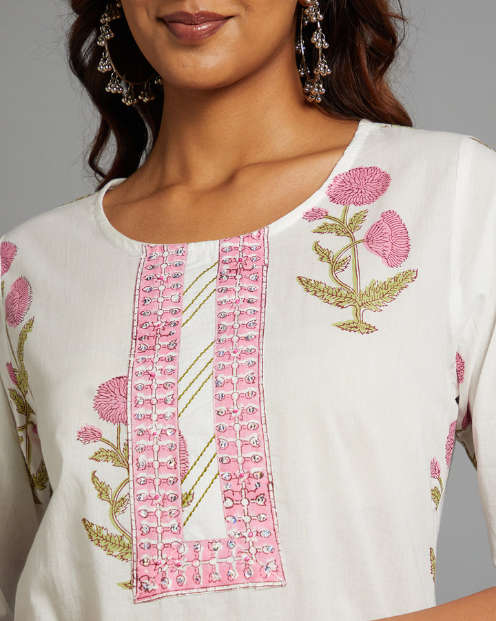 Close-up view of White Round Neck and Hand Block floral print Cotton Kurti, focusing on the fabric texture, neckline and stitching details.
