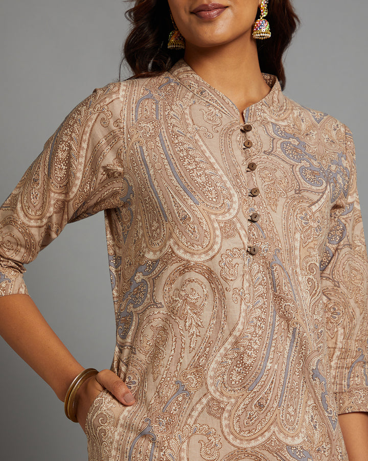 Close-up view of Brown Floral Hand Block Cotton V-Neck Kurti, focusing on the fabric texture,Wooden Buttons, neckline and stitching details.
