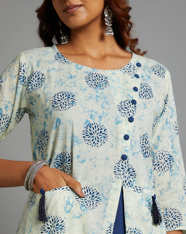 Close-up view of White and blue Cotton A-Line Kurti with Round Neck, focusing on the fabric texture, neckline and stitching details.

