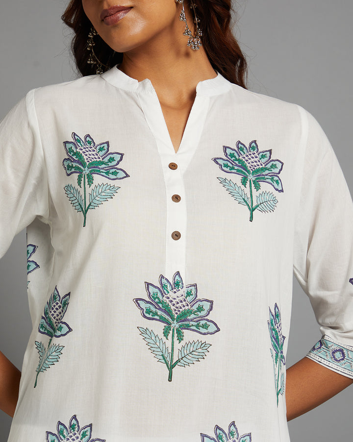 Close-up view of White Cotton Straight Kurta with Chinese Collar and V-Neck, focusing on the fabric texture, neckline and stitching details.
