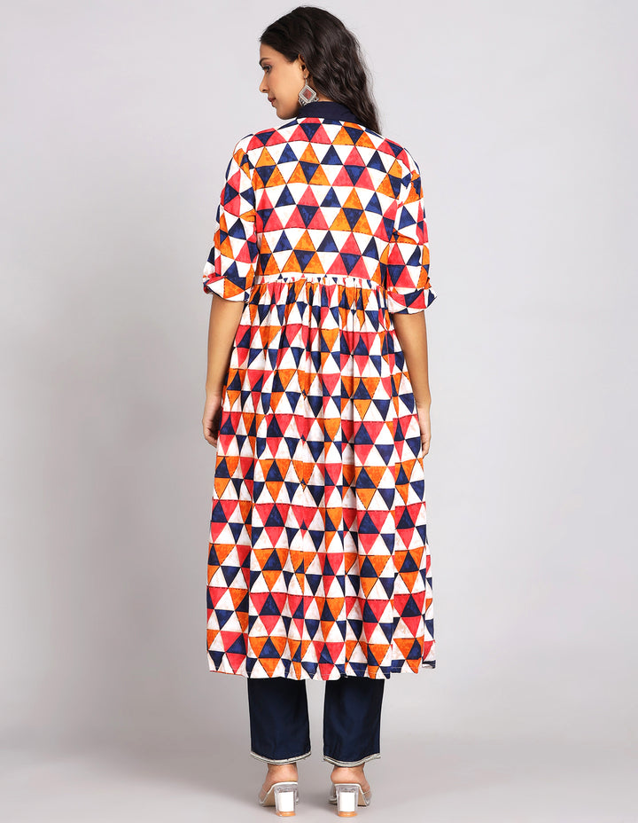 Woman showing the back view of a  Multicolor Printed Long Kurti with Collar Neck Design and three-fourth sleeves paired with white transparent sandals, highlighting the relaxed fit and simple design from behind.