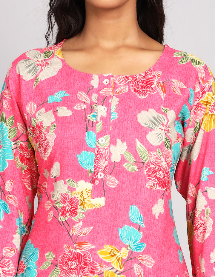 Close-up view of  Pink Color Floral Print Long Kurti with Round Neck design, focusing on the fabric texture, Buttons, neckline and stitching details.