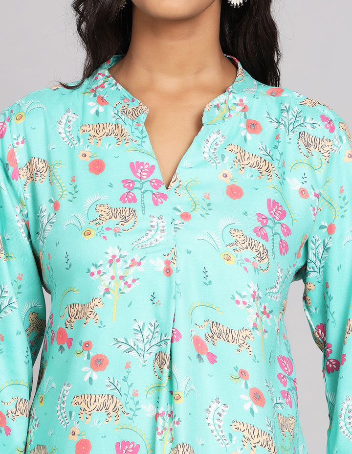 Close-up view of a Aqua Blue Floral Print Short Kurti, focusing on the fabric texture, neckline and stitching details.