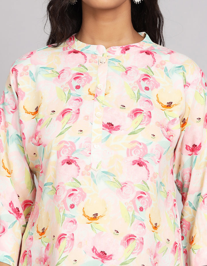 Close-up view of Multicolor Pastel Printed Short Kurti with Collar Neck Line, focusing on the fabric texture, neckline and stitching details.