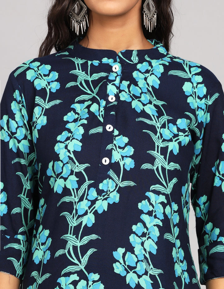 Close-up view of  Navy Blue Floral Printed Long Kurti with Collar Neck Line , focusing on the fabric texture, Buttons, neckline and stitching details.