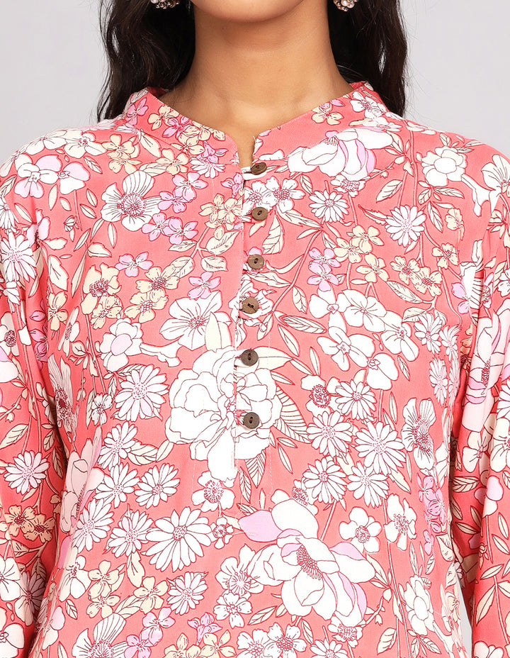 Close-up view of Peach Pink Long Kurti with Collar Neck Line, focusing on the fabric texture, Wooden Buttons, neckline and stitching details.