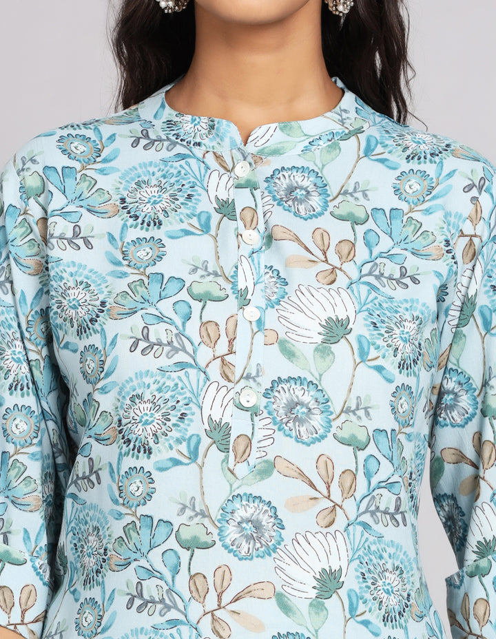 
Close-up view of Blue and Grey color Long Kurti with Collar Neck, focusing on the fabric texture, Buttons, neckline and stitching details.