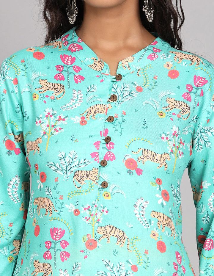 Close-up view of  Aqua Green printed long kurti , focusing on the fabric texture, wooden buttons, and stitching details.