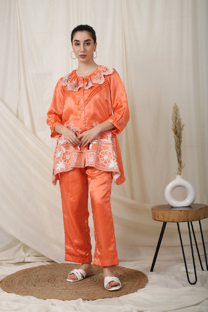 A model wearing the Coral Party and Casual Wear Set with intricate cut work and machine embroidery.