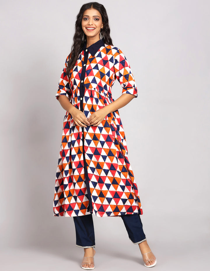 Side profile of a  Multicolor Printed Long Kurti with Collor Neck Design with three-fourth sleeves paired with white transparent sandals, showcasing the kurti's length and the smooth drape over the body