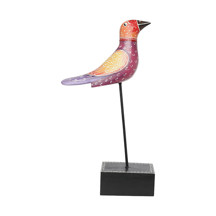 unique wooden bird figurine at iron rod